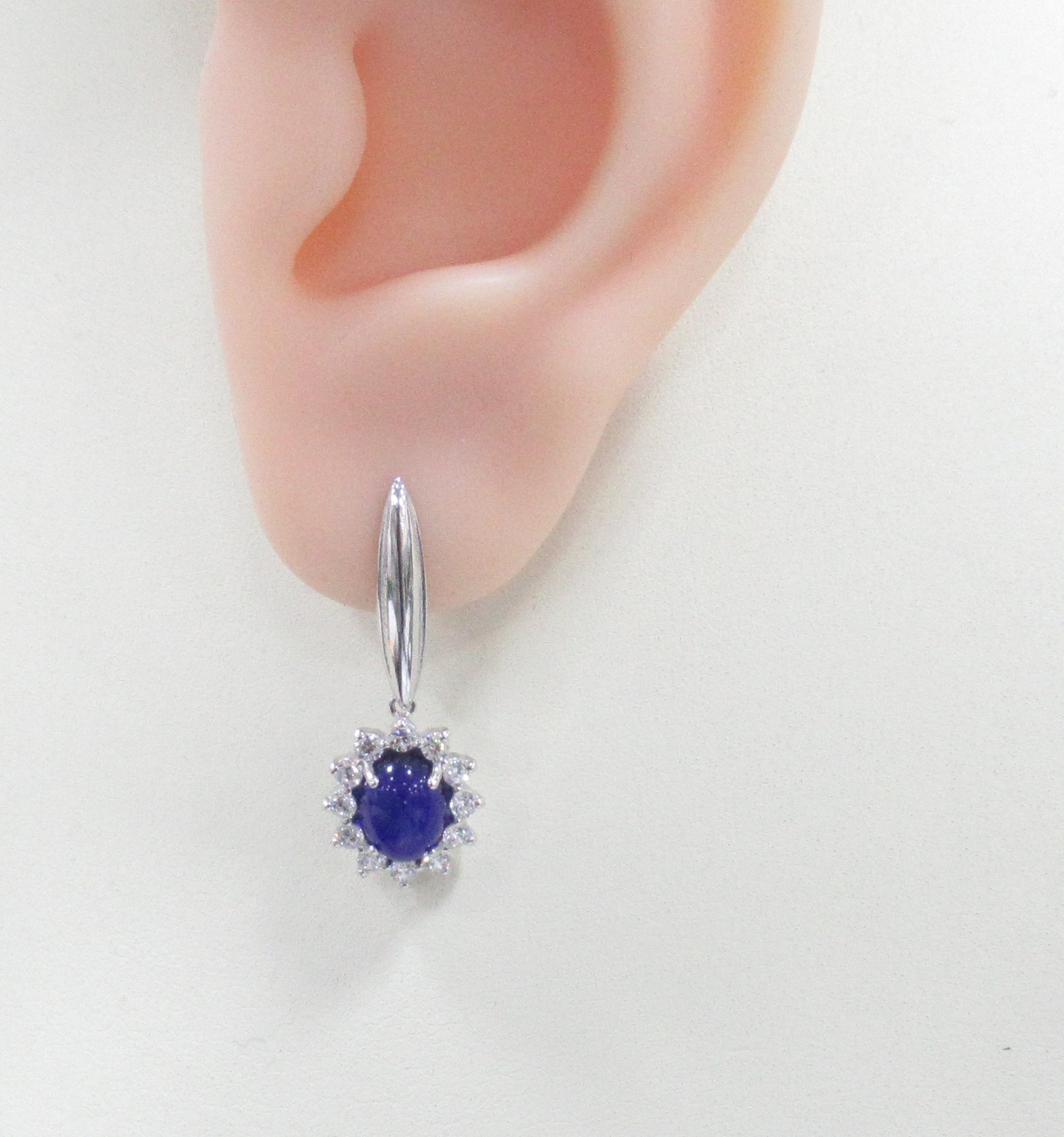 Серебряные серьги 925 пробы; вставки 2 Янтарь; 24 Фианит бесцв.;